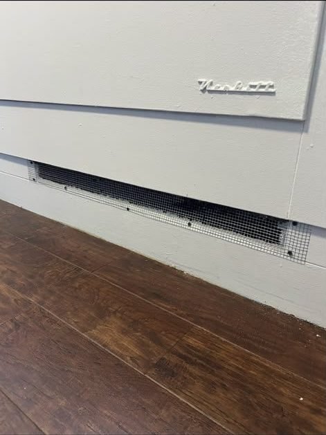Rodent entry point sealed with steel mesh at a utility penetration