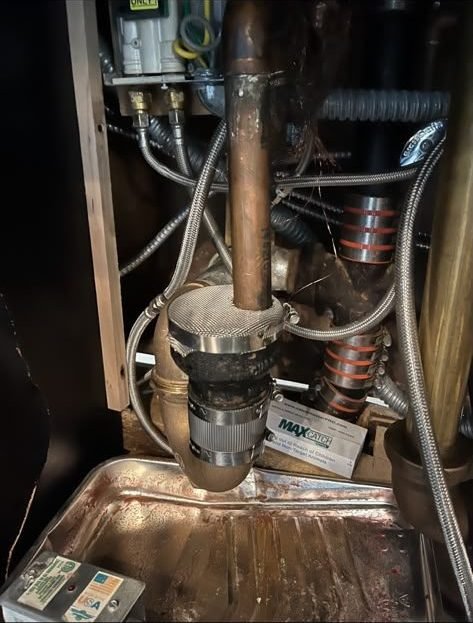 Pipe penetration sealed and monitored in a mechanical room